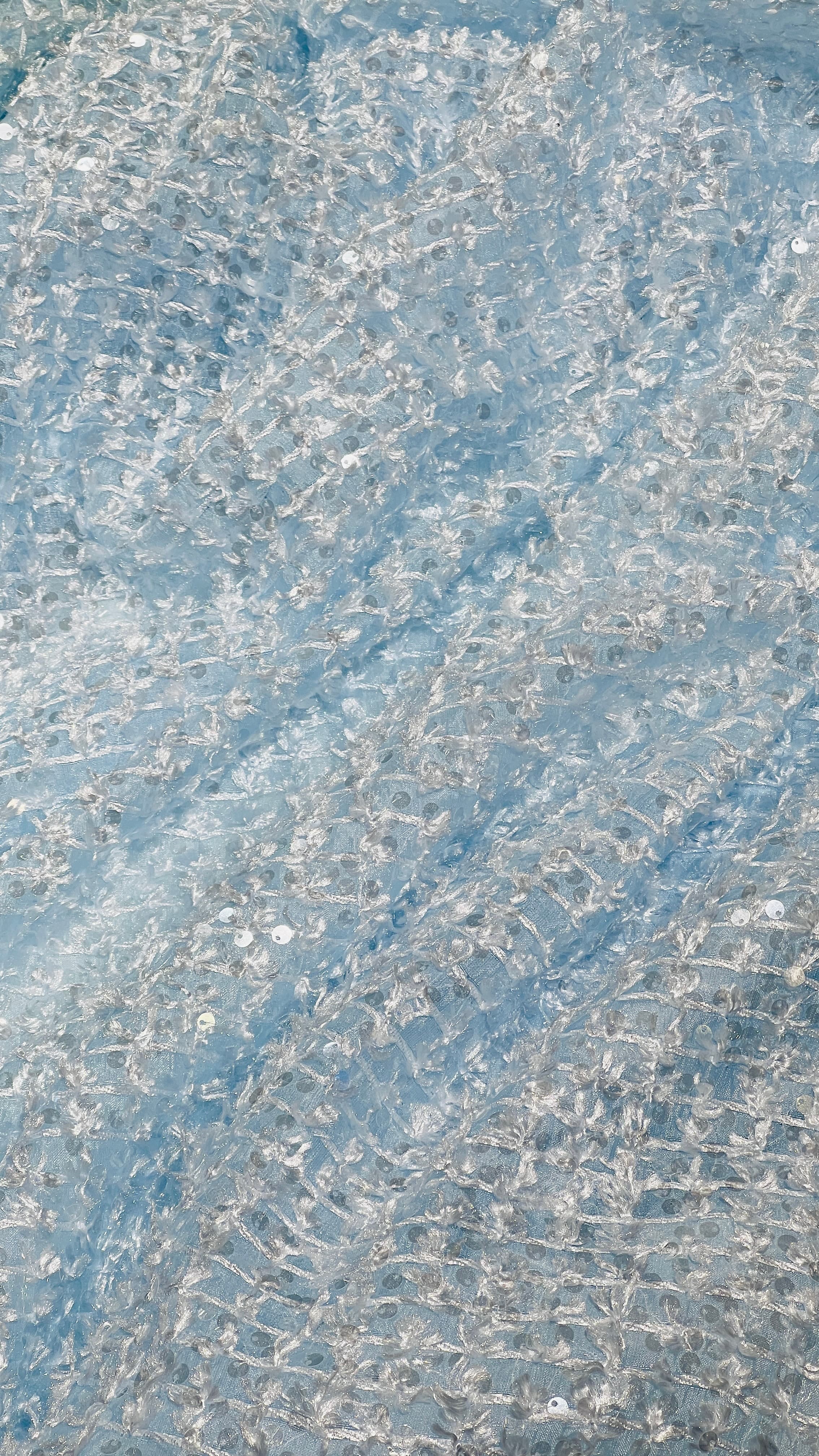 Textured organza fabric with yarn embroidery